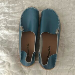 Blue leather flats